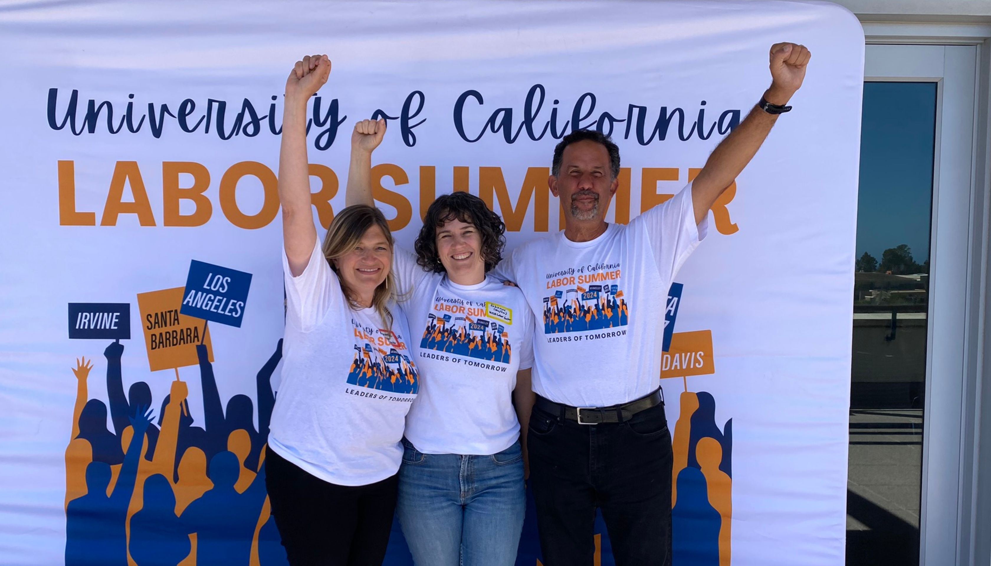 Labor Center staff including Carmen Rhodes, Fabienne Doiron, and Ralph Armbruster-Sandoval smile for a photo.